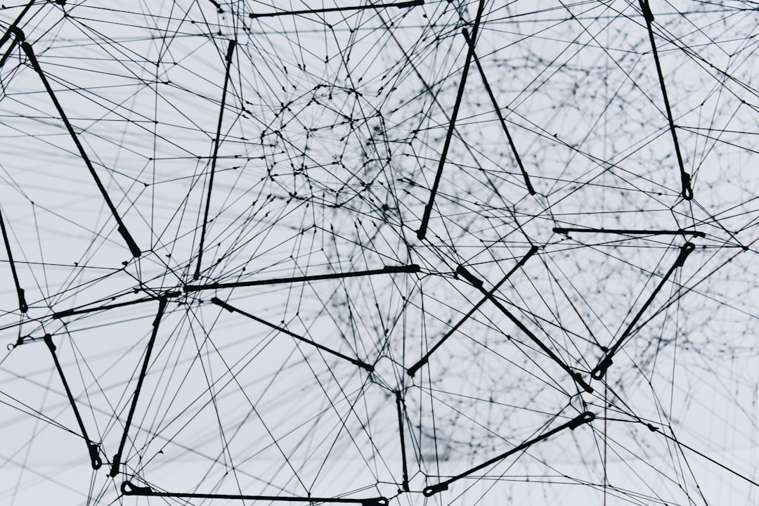 A stylized iconographic diagram showing a human figure connecting with multiple digital nodes, representing professional growth and network engagement A stylized iconographic diagram showing a human figure connecting with multiple digital nodes, representing professional growth and network engagement