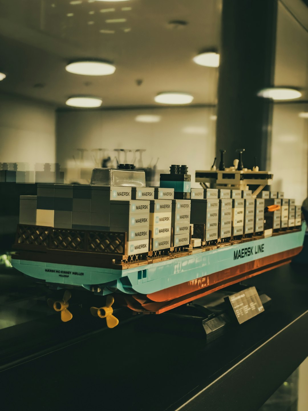 A 3D isometric representation of a ship, a warehouse, and a bank being instantly linked by smart contract code A 3D isometric representation of a ship, a warehouse, and a bank being instantly linked by smart contract code