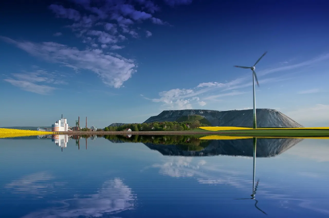 Mining containers operating beside wind and hydro facilities while surplus-power dashboards display hourly availability Mining containers operating beside wind and hydro facilities while surplus-power dashboards display hourly availability