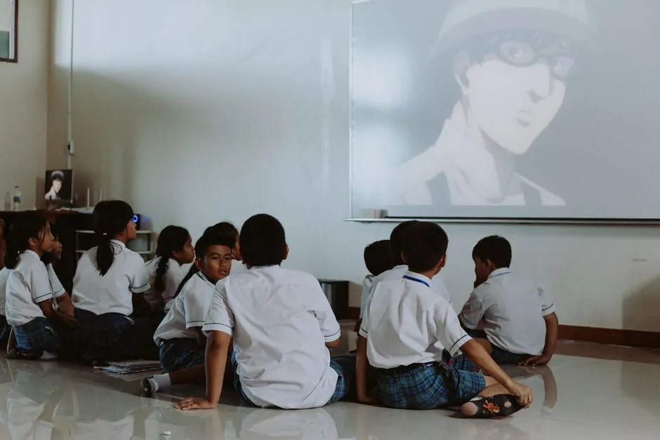 Modern classroom with diverse students watching Crypto Cobra Bitcoin fundamentals presentation on large screen Modern classroom with diverse students watching Crypto Cobra Bitcoin fundamentals presentation on large screen