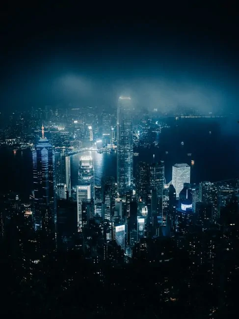 A high-level view of a financial district with digital overlays symbolizing global regulatory connections and policy frameworks A high-level view of a financial district with digital overlays symbolizing global regulatory connections and policy frameworks