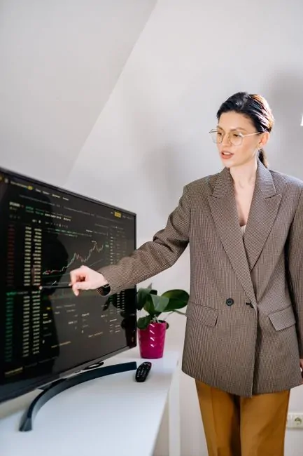 A professional data scientist analyzing a complex network of cryptocurrency transaction flow charts on a large monitor. A professional data scientist analyzing a complex network of cryptocurrency transaction flow charts on a large monitor.